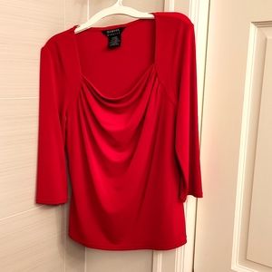 Red blouse with a square cowl neck